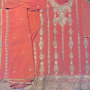 3 piece stitched pink and gold suit with pink silk pants and dupatta with motifs